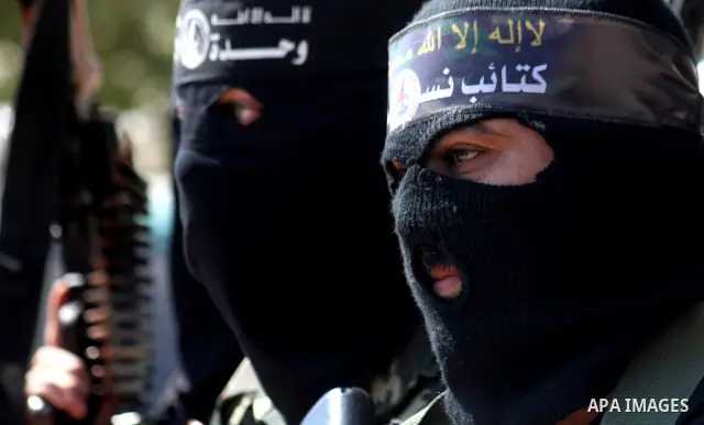 Masked Palestinian militants, some from Hamas, hold a press conference in Gaza City on October 6, 2010. About two dozen gunmen from various groups accused Palestinian President Mahmoud Abbas' security forces of arresting...
