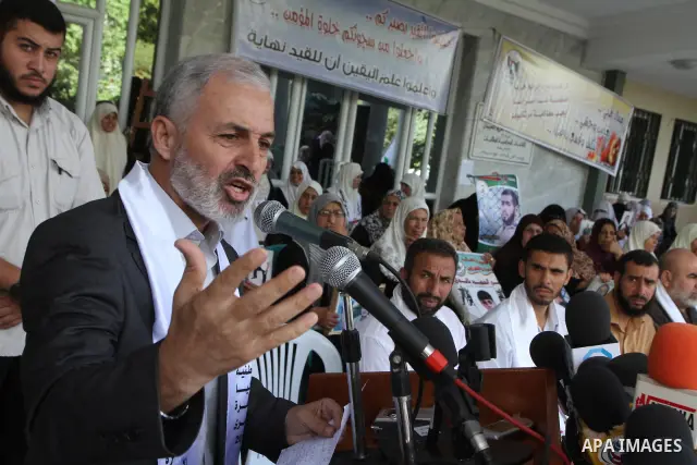 Palestinian Prisoner Minister in Gaza Strip, Mohammed Al-Ghoul delivers speech durring a protest against the Israeli soldier who humiliated the female Palestinian prisoner as he appeared in a videotape dancing in front o...