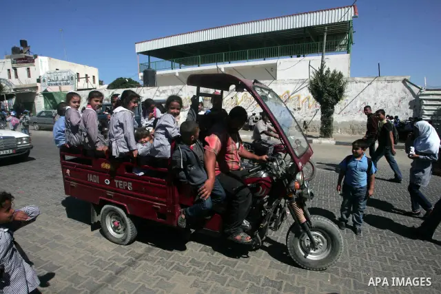 Palestinian students riding unsafe transportation to go and return from their schools , in the southern Gaza Strip town of Rafah on October 12, 2010 . UNRWA Media advisor ,Adnan Abu Hasna , said in a press statement that...