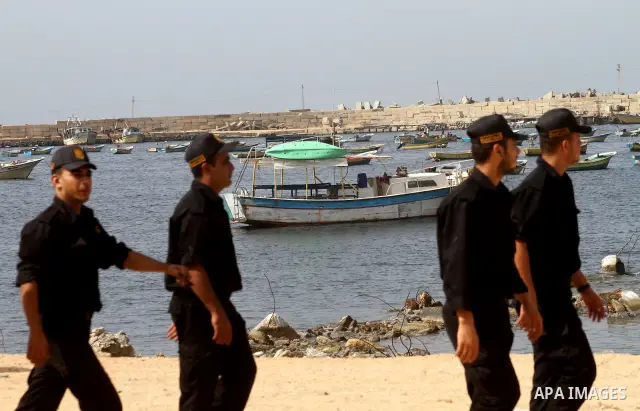 Palestinian Hamas police officers stand guard during a rally to demand the lifting of an Israeli blockade on the Gaza Strip, on October 17, 2010, a day after a delegation of the Elders group of retired world figures visi...