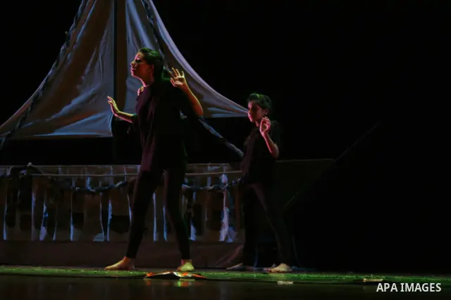 Palestinian children are performing the play "Gaza mono-logues" in the Cultural Palace,in the West Bank city of Ramallah on Oct. 17, 2010 . Photo by Issam Rimawi