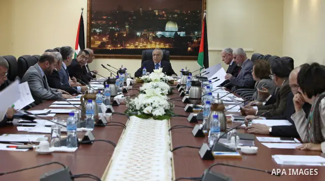 Palestinian Prime Minister Salam Fayyad , during heading the Palestinian Cabinet meeting , in the West Bank city of Ramallah on Oct. 18,2010 . Photo by Mustafa Abu Dayeh