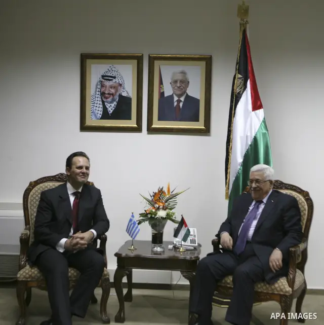 Palestinian President Mahmoud Abbas (Abu Mazen) during a meeting with the Foreign minister of Greece, Dimitris Draoucas in the West Bank city of Ramallah on Oct. 18, 2010. Photo by Eyad Jadallah