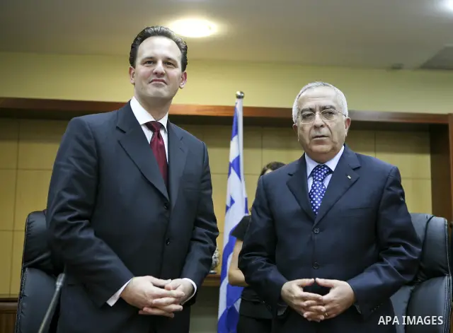 Palestinian Prime Minister Salam Fayyad during the signing agreement ceremony with the foreign minister of Greece, Demetrios Drotsas in the West Bank city of Ramallah on Oct. 18,2010. Photo by Eyad Jadallah