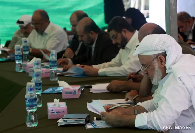 Palestinian legislative council members take part during the meeting in Gaza City on Oct. 19,2010 . Photo by Mohammed Asad