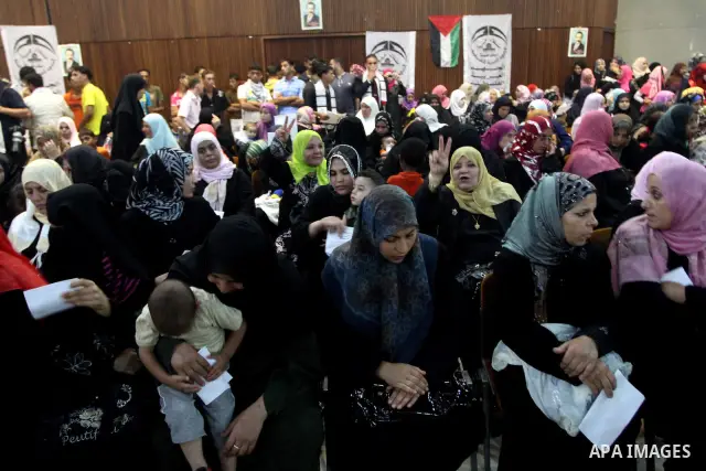 Palestinians attend a rally at Rashad al-Shawa center , in Gaza City on Oct. 19, 2010 marking the 42nd anniversary of the Palestinian Arab Front founding . And also to support the national unity and against the division...