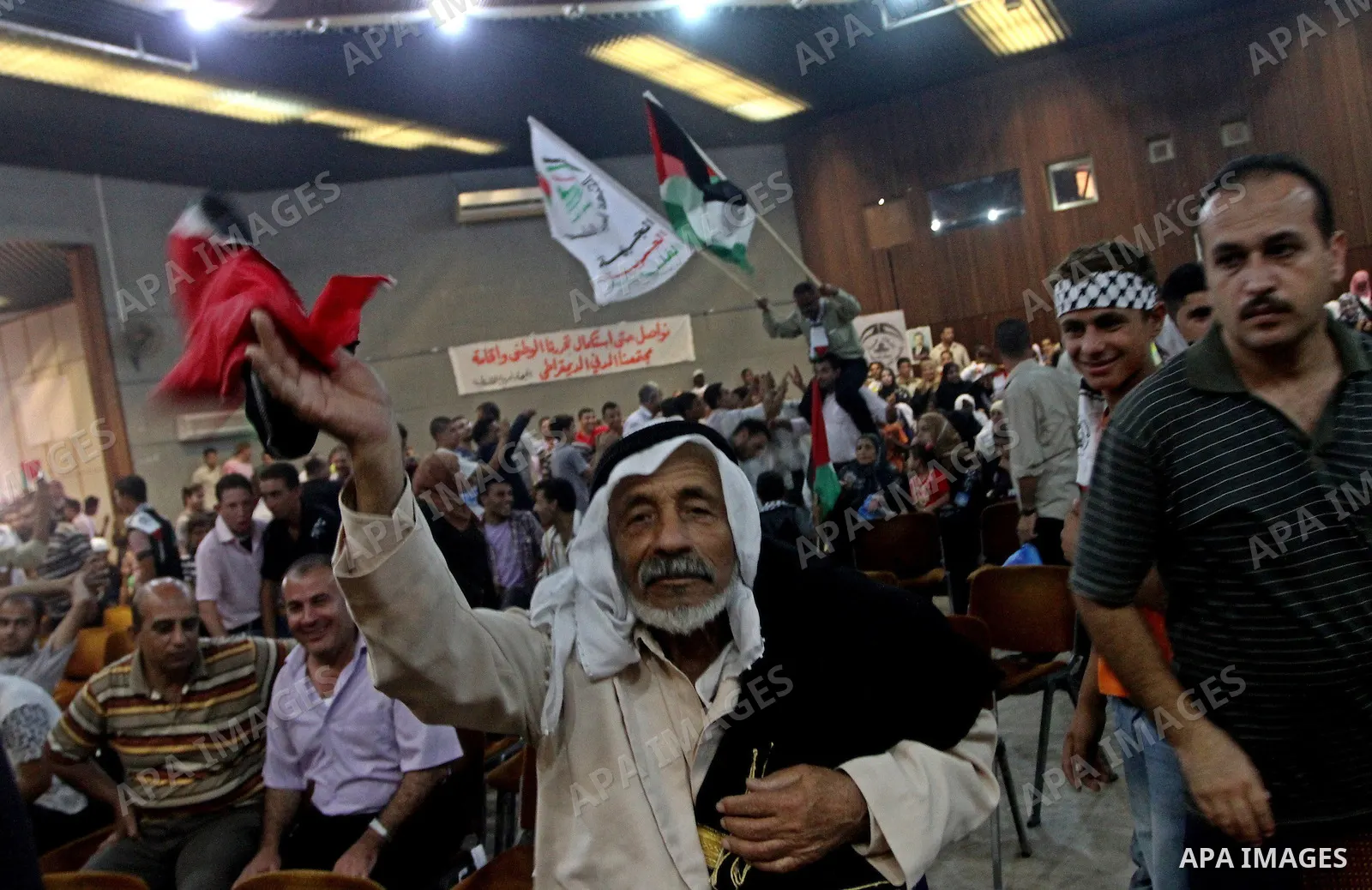 Palestinians attend a rally at Rashad al-Shawa center , in Gaza City on Oct. 19, 2010 marking the 42nd anniversary of the Palestinian Arab Front founding . And also to support the national unity and against the division...