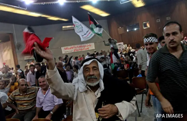 Palestinians attend a rally at Rashad al-Shawa center , in Gaza City on Oct. 19, 2010 marking the 42nd anniversary of the Palestinian Arab Front founding . And also to support the national unity and against the division...