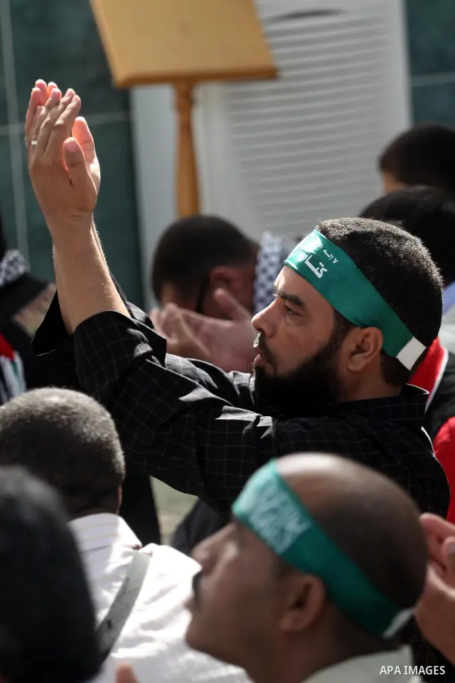 Palestinian Prime Minister in Gaza Strip, Ismail Haniyeh attends Friday prayers while international activists gather in the mosque in Gaza city on 22 October 2010. An aid convoy carrying over 300 international activists...