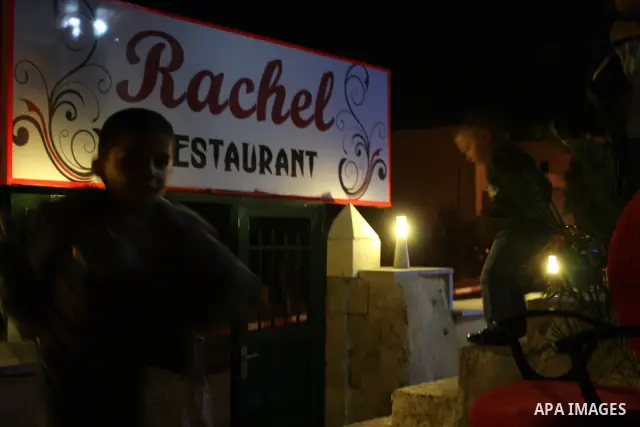 Palestinians gather for the opening of 'Rachel Restaurant' in the West Bank town of Ramallah , on October 23, 2010, in honor of US peace activist from Washington DC "Rachel Corrie" , who was crushed to death on March 16,...