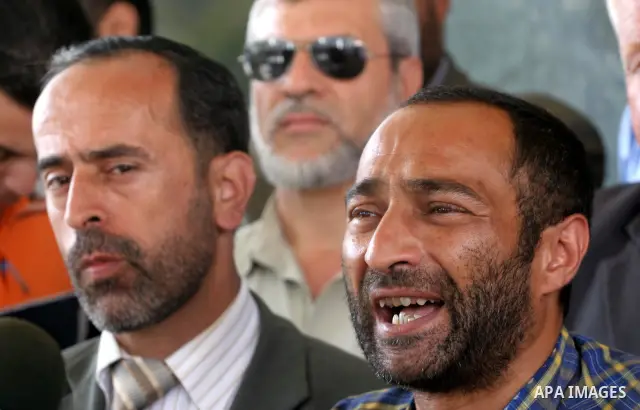 Director of the convoy, Kevin Aovindon delivers a speech during a press conference about the end of their tour in the Gaza Strip , in Gaza City, on Oct. 24, 2010. Lifeline "5" aid convoy left the Gaza Strip on Sunday aft...