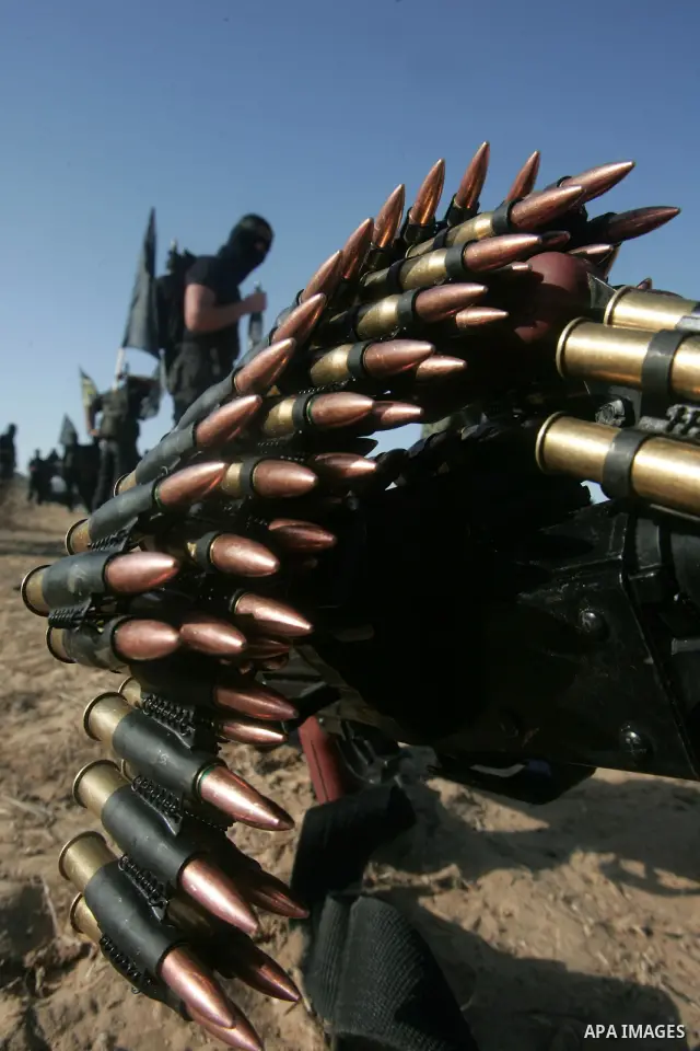 Palestinian militants of Islamic Jihad movement take part in a military parade, in the southern Gaza Strip town of Rafah on Oct. 28, 2010. Photo by Khaled Khaled