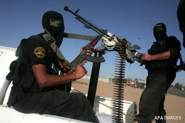 Palestinian militants of Islamic Jihad movement take part in a military parade, in the southern Gaza Strip town of Rafah on Oct. 28, 2010. Photo by Khaled Khaled