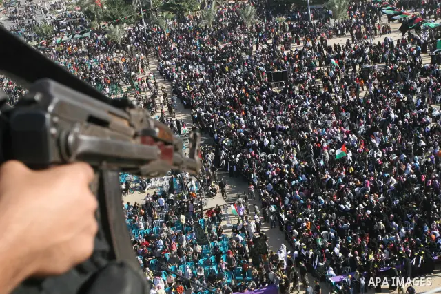 Palestinian Islamic Jihad supporters attend a rally to mark the 23rd anniversary of the establishment of the Islamic Jihad movement and the assassination of the founder of their movement Fathi Shiqaqi , in Gaza city on O...