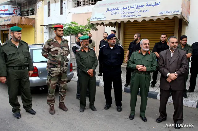 Palestinians military officers police checking for government vehicles during campaign to check the employees who work in the Palestinian government , in Gaza City on Nov. 1,2010 . Photo by Mohammed Asad