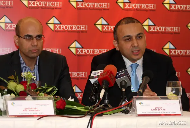 The chief executive officer of the paltel group, Ammar Aker (R) and the chairman of Pita/picti, Alaa Alaeddin (L), during their joint press conference in the West Bank town of Ramallah, Monday, Nov. 1, 2010. Photo by Iss...