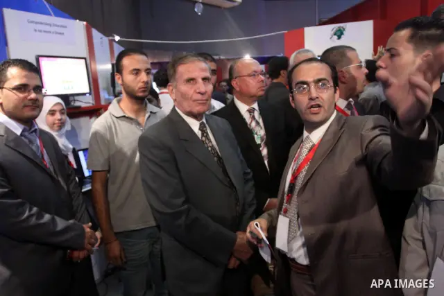 Palestinians attend to the Expotech exhibition for telecom and information technology , in Gaza City on Nov. 4,2010 . Photo by Mohammed Asad
