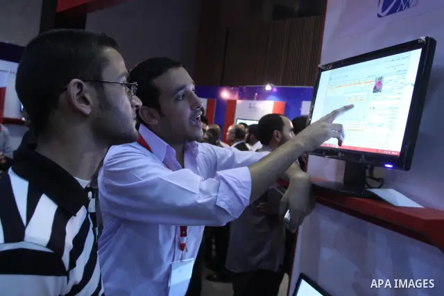 Palestinians attend to the Expotech exhibition for telecom and information technology , in Gaza City on Nov. 4,2010 . Photo by Mohammed Asad