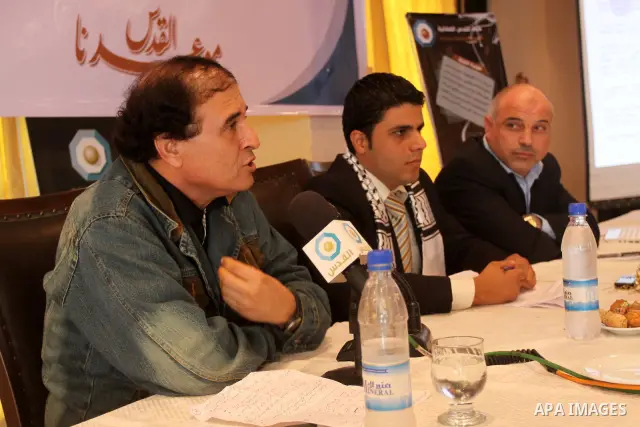 Palestinians attend a meeting about passage of two years of starting the Al-Quds TV , in Gaza City on Nov. 11,2010 . Photo by Mohammed Asad