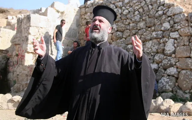 Christians, Jews and Muslims join a prayer calling for rain on November 11, 2010 in the West Bank village of Walajeh near Bethlehem. The amounts of rainfall in Israel and Palestinian territories have been lower than the...