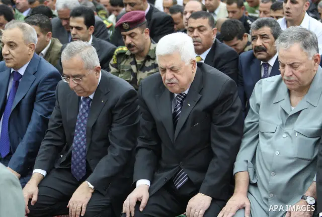 Palestinian President Mahmoud Abbas (Abu Mazen) attends a special prayer on the first day of Eid al-Adha in the West Bank city of Ramallah on Nov.16,2010. Muslims around the world celebrate Eid al-Adha to mark the end of...