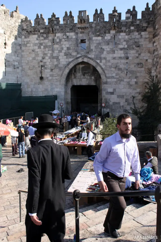 Palestinians celebrate in Jerusalem's old city on the second day of Eid al-Adha,on November, 17, 2010. as Muslims worldwide commemorate Eid al-Adha, or the Feast of the Sacrifice, marking the end of the hajj and commemor...