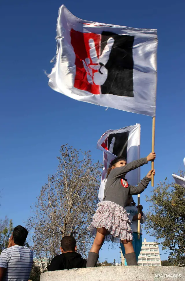 Left-wing Israelis and Palestinians protest against the Jewish takeover of Arab properties in the Sheikh Jarrah neighborhood of East Jerusalem on 19 November 2010. Several hundred people turned out today to protest the c...