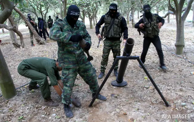 Palestinian militants of the Nasser Salah al-Din Brigades, the military wing of the Popular Resistance Movement take part in a training exercise in Gaza City on Nov 22,2010. The Nasser Salah al-Din Brigades warned Israel...
