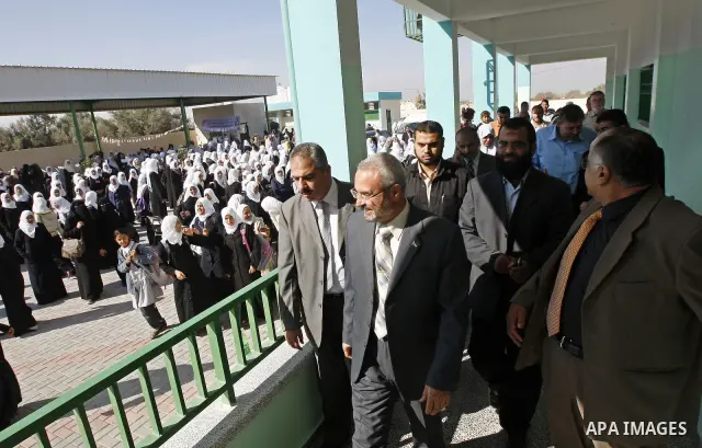 Palestinian Minister of Education in Gaza , Mohammed Asqul opens a new high school for students girls , in the southern Gaza Strip town of Rafah , on November 25,2010 . Photo by Abed Rahim Khatib