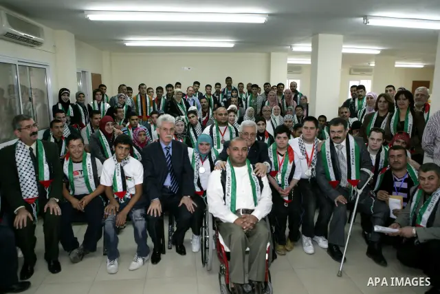 Palestinian President Mahmoud Abbas (Abu Mazen) during the meeting with the members of the Special Olympics in the West Bank city of Ramallah on Nov. 25,2010. Photo by Issam Rimawi