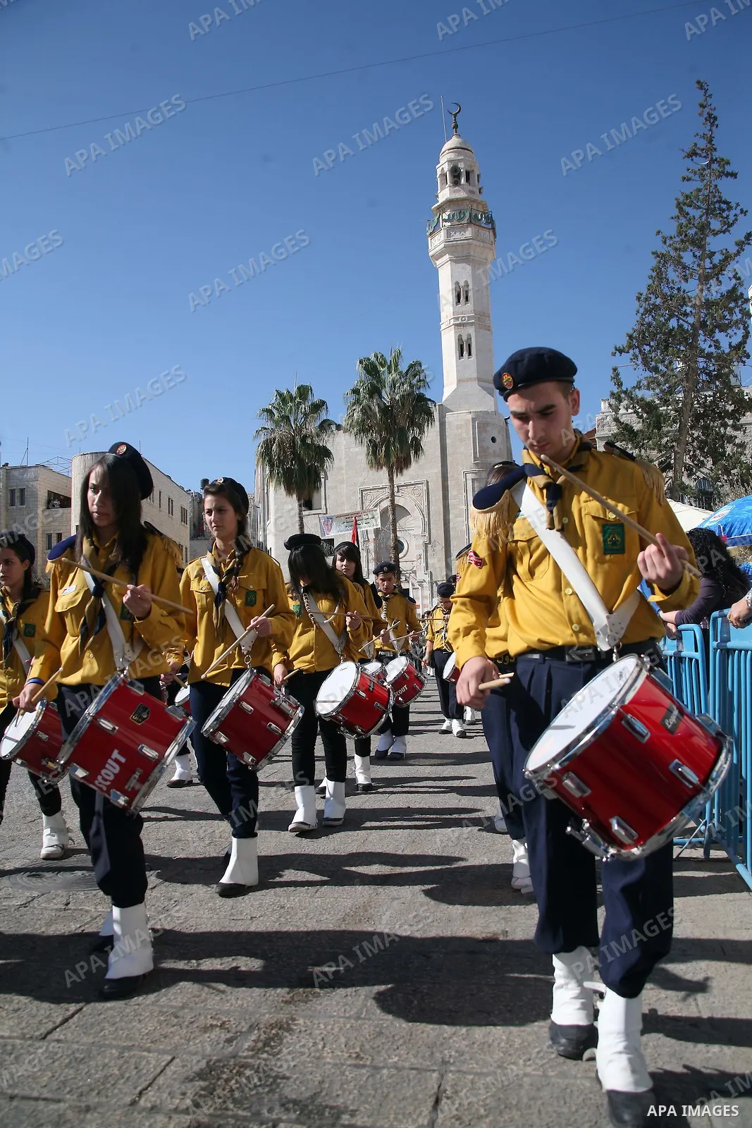 Palestinian take part during the Christian Custodian of the Holy Land, Pierbattista Pizzaballa of the Franciscan order, visits the Church of St. Catherine in the West Bank town of Bethlehem on November 27, 2010. The visi...