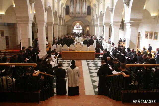 The Christian Custodian of the Holy Land, Pierbattista Pizzaballa of the Franciscan order, visits the Church of St. Catherine in the West Bank town of Bethlehem on November 27, 2010. The visit marked the beginning of the...