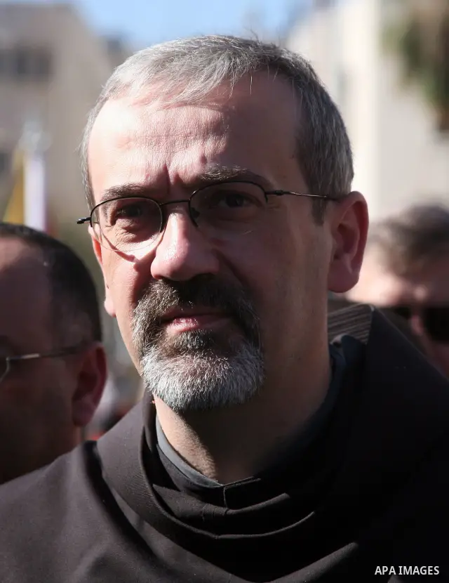 The Christian Custodian of the Holy Land, Pierbattista Pizzaballa of the Franciscan order, visits the Church of St. Catherine in the West Bank town of Bethlehem on November 27, 2010. The visit marked the beginning of the...