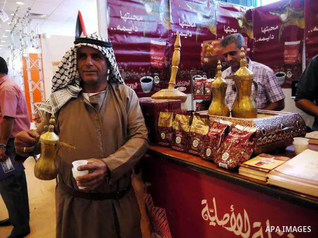 Palestinians display their products in the exhibition "National Industries 2010" in the West Bank city of Ramallah, on Nov. 28, 2010. Photo by Issam Rimawi