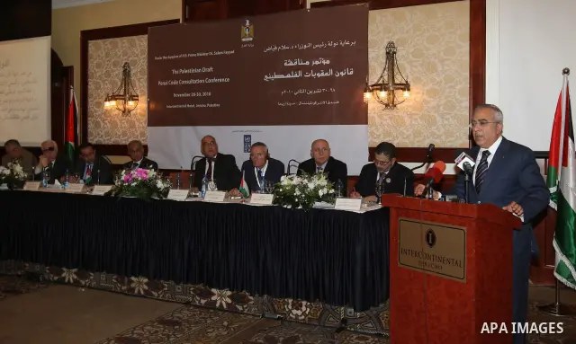 Palestinian Prime Minister Salam Fayyad delivers speech during the opening ceremony for the Palestinian Draft Penal Code Consultation conference in the West Bank city of Ramallah on Nov. 28,2010. Photo by Mustafa Abu Day...