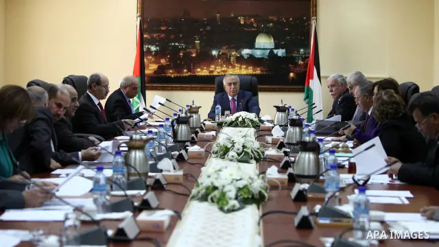 Palestinian Prime Minister Salam Fayyad while heading the Palestinian Cabinet meeting in the West Bank City of Ramallah on November 29, 2010. Photo by Mustafa Abu Dayeh