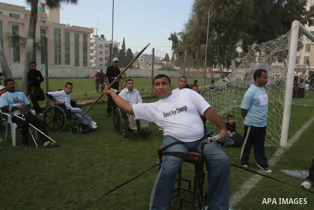 Disabled Palestinians participate in an athletics championship for disabled , in Gaza city on Nov. 29,2010. Photo by Mohammed Asad