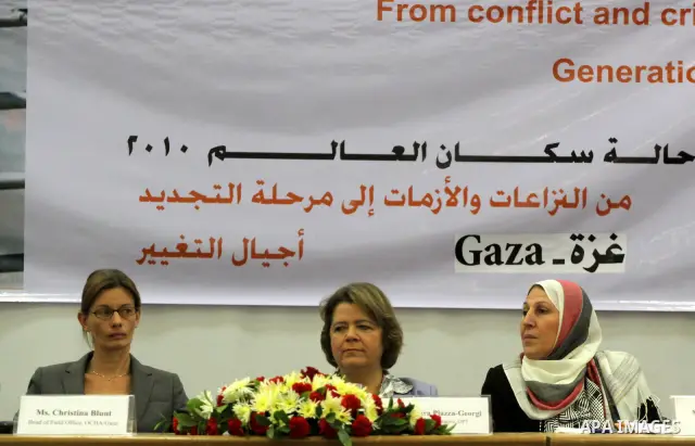 Palestinians attend the launching of the state of world population 2010 from conflict and crisis to renewal ,in Gaza City on Nov. 30,2010. Photo by Mohammed Asad