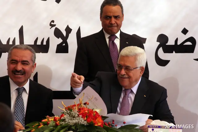 Palestinian President Mahmoud Abbas delivers speech during his visit to the West Bank village of Surda, north of Ramallah 01 December 2010. Abbas arrived to lay the foundation stone for the new Palace of the Presidency i...