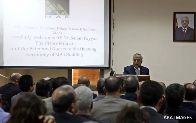 Palestinian Prime Minister Salam Fayyad during the opening ceremony of Mass building conference for the Palestinian Economic Policy Research Institute in the West Bank town of Ramallah on Dec. 1,2010. Photo by Mustafa Ab...