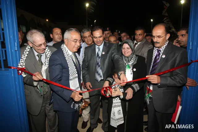 Palestinian Prime Minister Salam Fayyad attend the opening of a new school in the West Bank village of Beit Iba, west Nablus, Thursday, on Dec. 2, 2010. Photo by Mustafa Abu Dayeh
