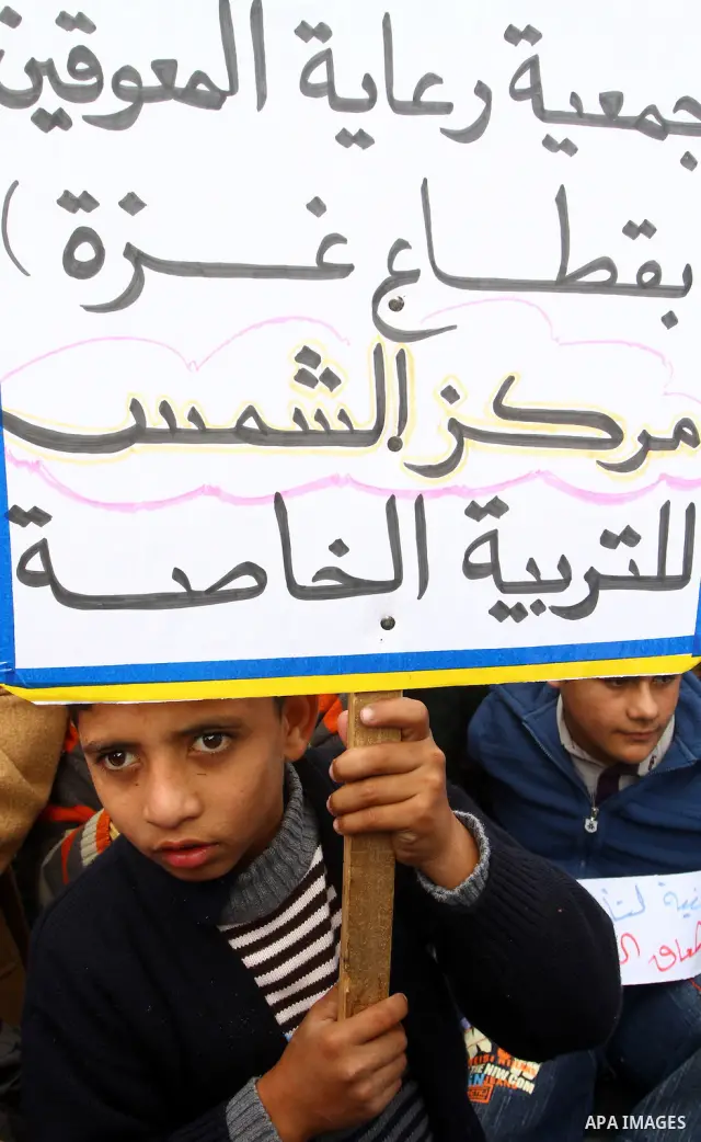 Disabled Palestinians participate in a rally marking the International Day for Persons with Disabilities in Gaza City, on Dec. 6, 2010. Photo by Ashraf Amra
