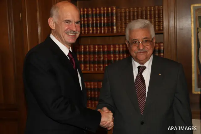 Palestinian President Mahmoud Abbas (Abu Mazen) during a meeting with Greek Prime Minister George Papandreou, in Athens on Dec. 8,2010. Photo by Thaer Ganaim