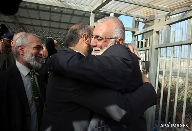Mohammed Abu Teir, a deputy in the Palestinian Legislative Council by the Department of Jerusalem is welcomed by Palestinians after his release from Israeli jails and his return to the West Bank "Ofer" military checkpoin...