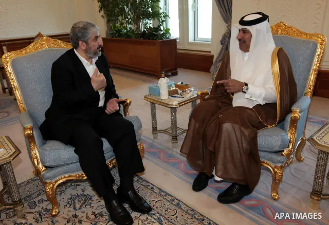 Palestinian Hamas leader Khaled Meshaal meets with the Emir of Qatar, Sheikh Hamad bin Khalifa Al-Thani in Doha on Dec. 8,2010. Photo by STR