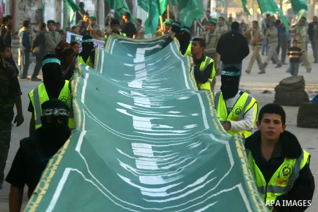 Palestinian Hamas supporters take part in a rally in the preparation of the anniversary of Hamas Islamic movement foundation in the southern Gaza Strip town of Rafah on December 10, 2010. Photo by Abed Rahim Khatib