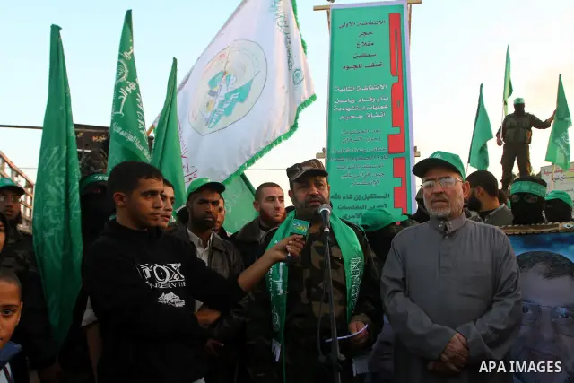Palestinian Hamas supporters take part in a rally in the preparation of the anniversary of Hamas Islamic movement foundation in Deir Al-Balah in the central Gaza Strip on December 10, 2010. Photo by Ashraf Amra