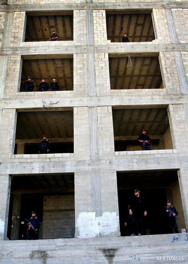 Palestinian Hamas security forces stand guards during a Hamas rally in Gaza City December 14, 2010. The rally marks the 23rd anniversary of the founding of the Hamas movement. Photo by Ashraf Amra