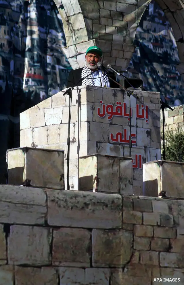 Palestinian Prime Minister in Gaza Strip, Ismail Haniyeh delivers a speech at a Hamas rally in Gaza City December 14, 2010. The rally marks the 23rd anniversary of the founding of the Hamas movement. Photo by Ashraf Amra