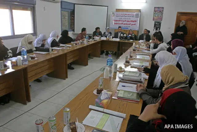 Palestinians attend meeting against the Israeli violations against the female Palestinian prisoners , in Gaza City on Dec. 16,2010. Photo by Mohammed Asad